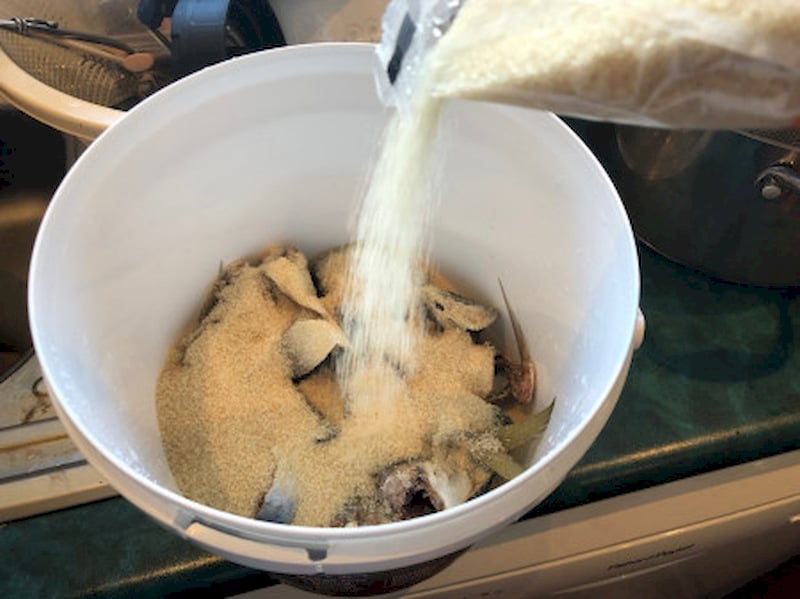 Step 2: Weigh fish and brown sugar at a precise 1:1 ratio. Some practitioners add extra sugar (e. g., 14 lbs sugar for 12 lbs fish) for better fermentation control – this is optional